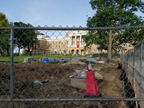 Photo: Bascom Hall with ditch in front, behind chain link fence