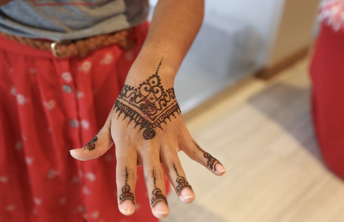 Closeup photo of the henna design on a hand