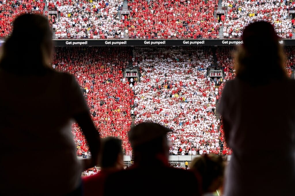 In return for wearing the correct color, fans were treated to a 35-14 win over the Michigan Wolverines.