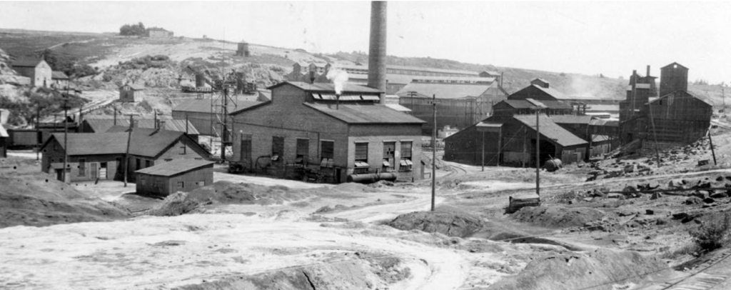 Black and white photo of an old lead and zinc mine.