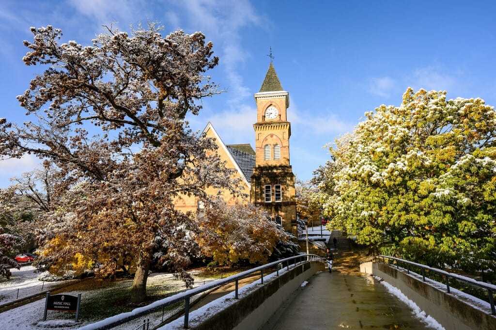 Photo: Music hall framed by snow-colored branches.