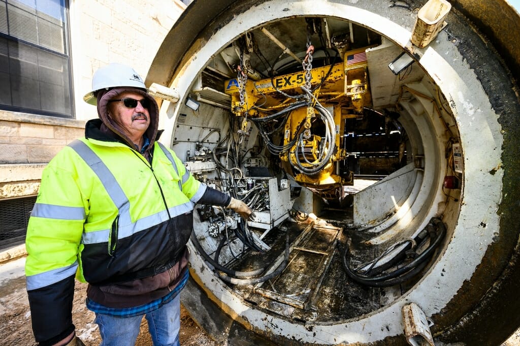 Patrick Minger, CEO of Minger Construction of Jordan, Minn., explains how his company's custom-made 11-foot diameter tunnel bore head works.