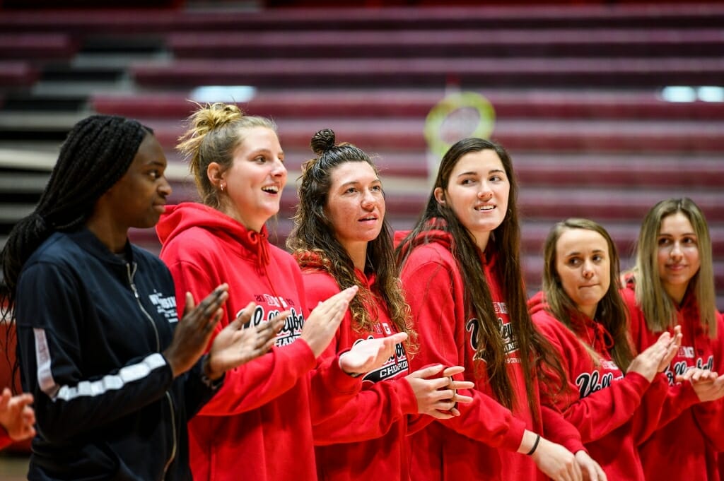 Photo: Volleyball players line up.