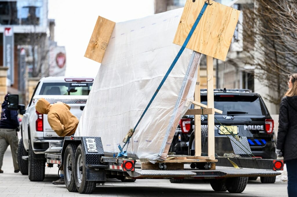 A truck pulls up to the Chazen with a mural on it.