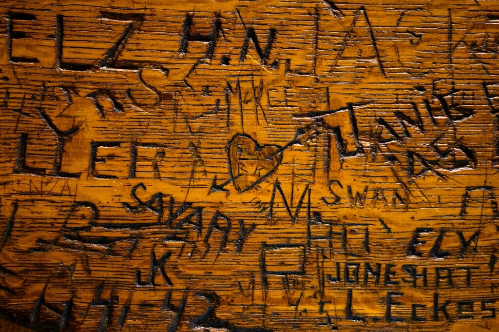 Cupid has clearly visited this vintage wooden table at the Memorial Union's Der Rathskeller.