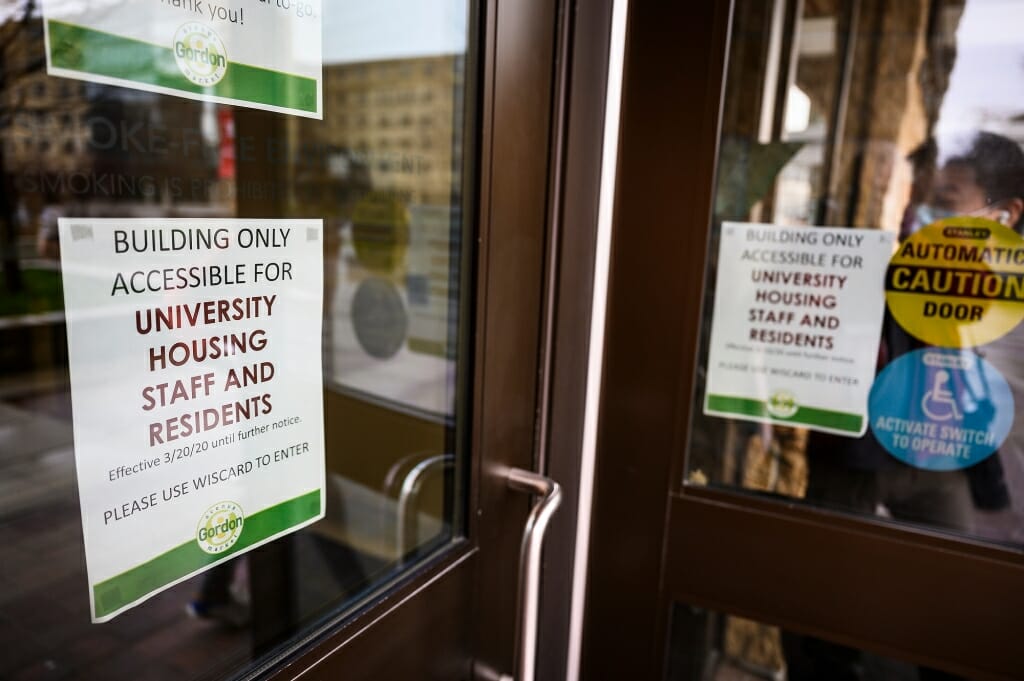 Signs posted on the door.