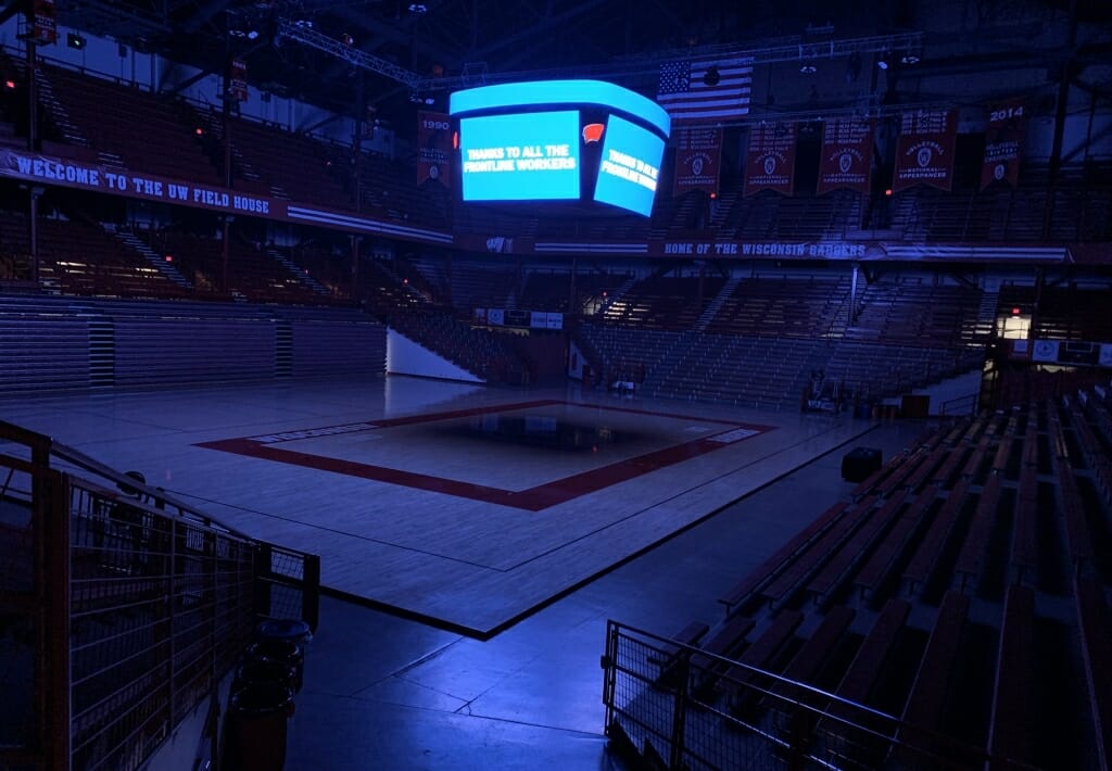 The Field House volleyball floor was bathed in blue.