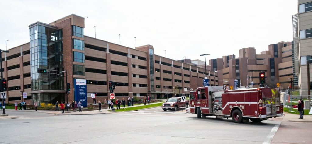 Fire truck rounding corner on way to hospital