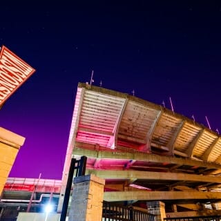 An exterior shot of Camp Randall Stadium at twilight.