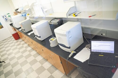 Lab equipment on a desk.