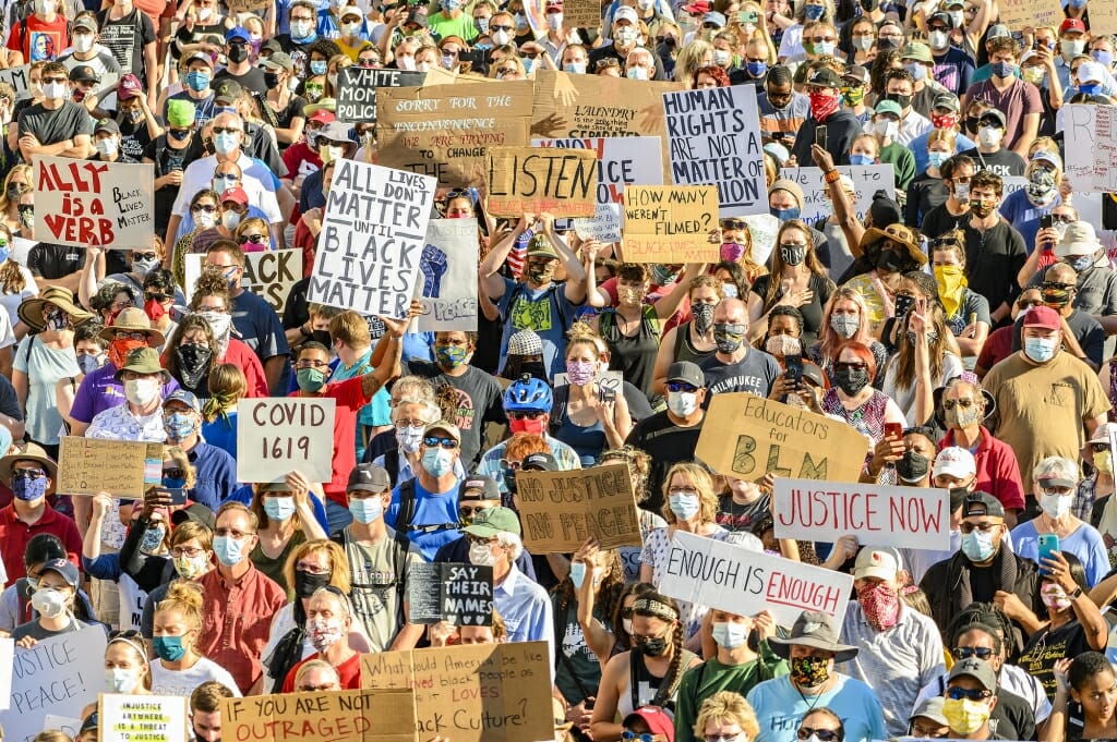 Protestors marching in street