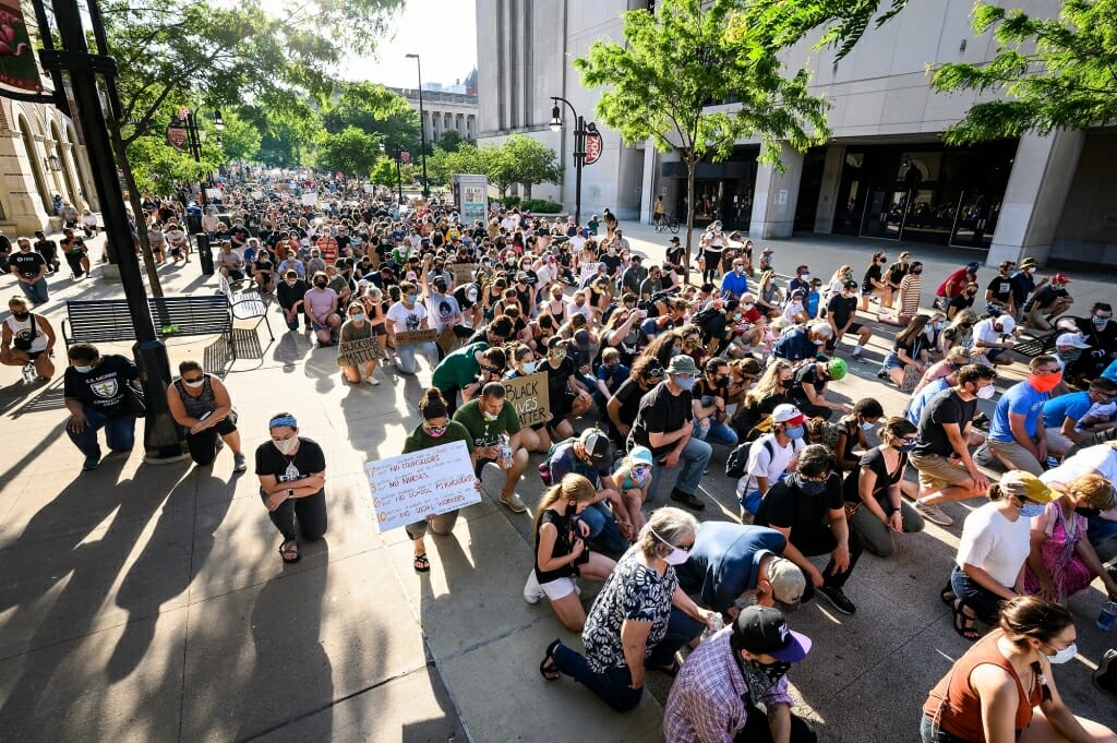 The group stopped every eight minutes and 46 seconds — the length of time a Minneapolis police officer knelt on George Floyd's neck before Floyd died.