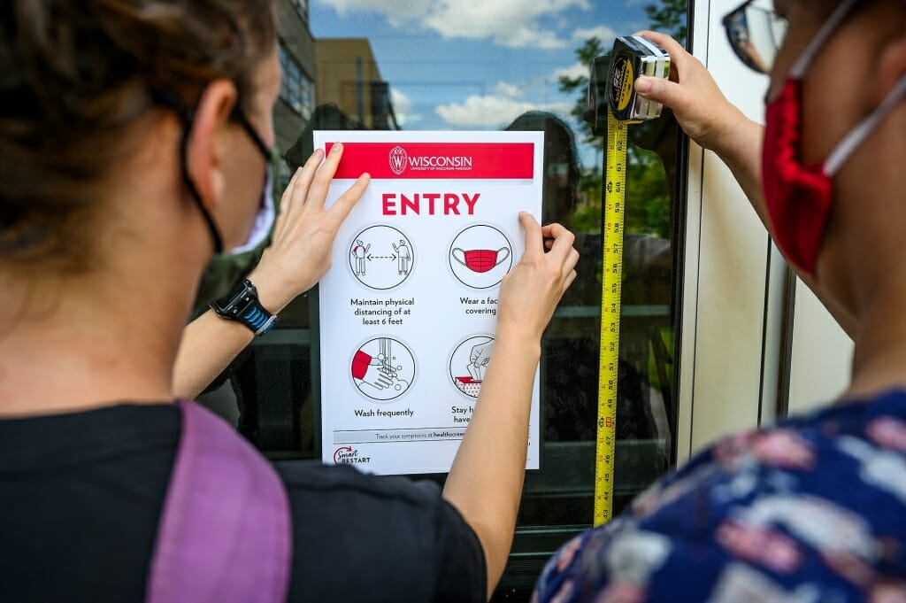 Signs will identify designated entry points, places to stand, and traffic patterns.