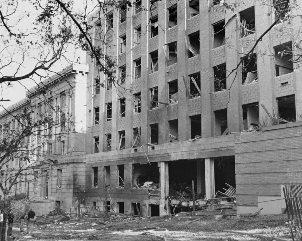 Exterior of Sterling Hall with windows blown out