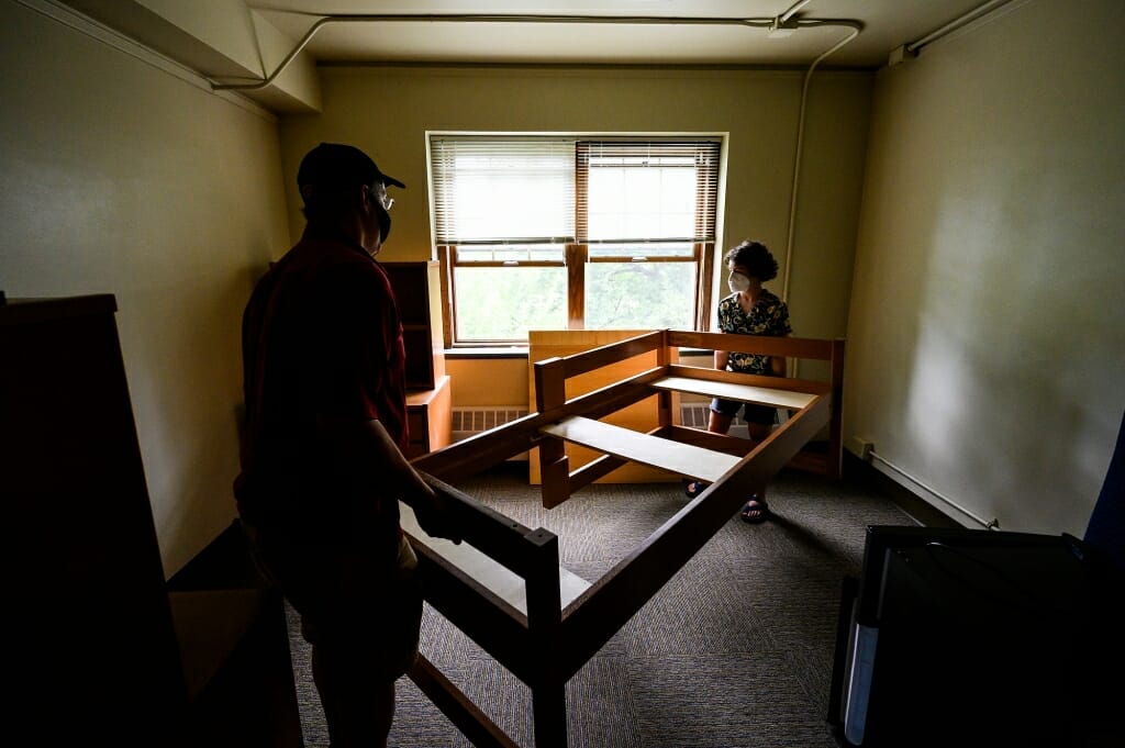 The Rosenbergs put together a loft bed frame.