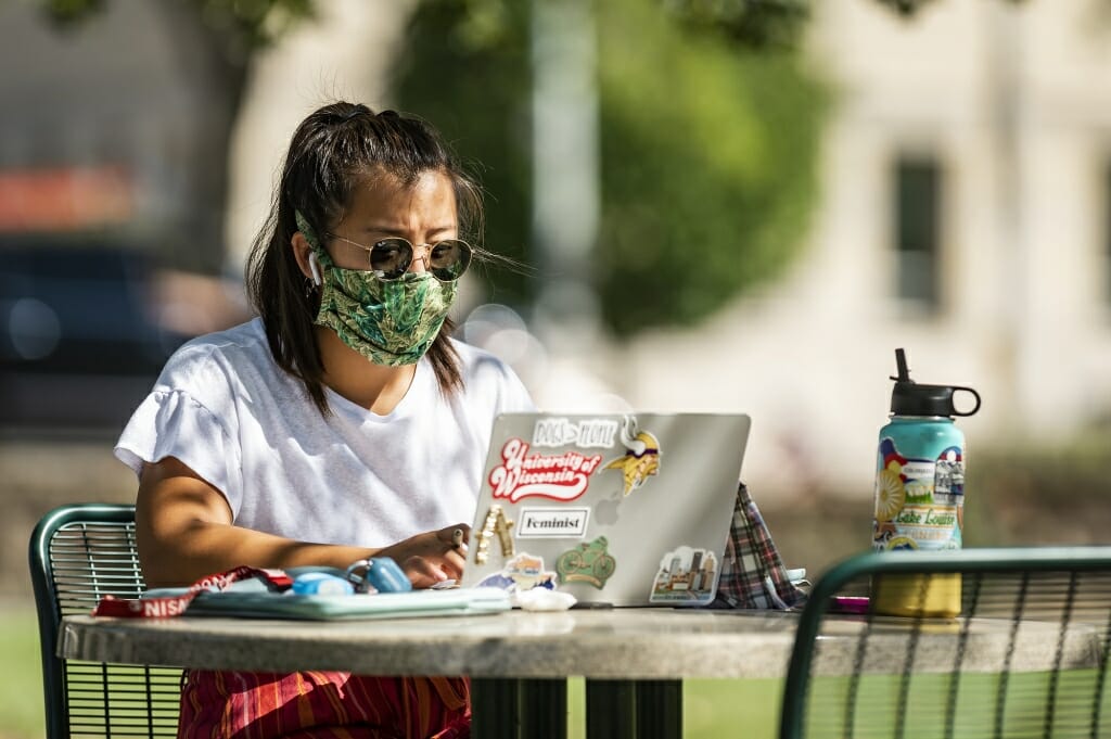 Student Anna Ankerstjerne enjoyed the sun while studying.