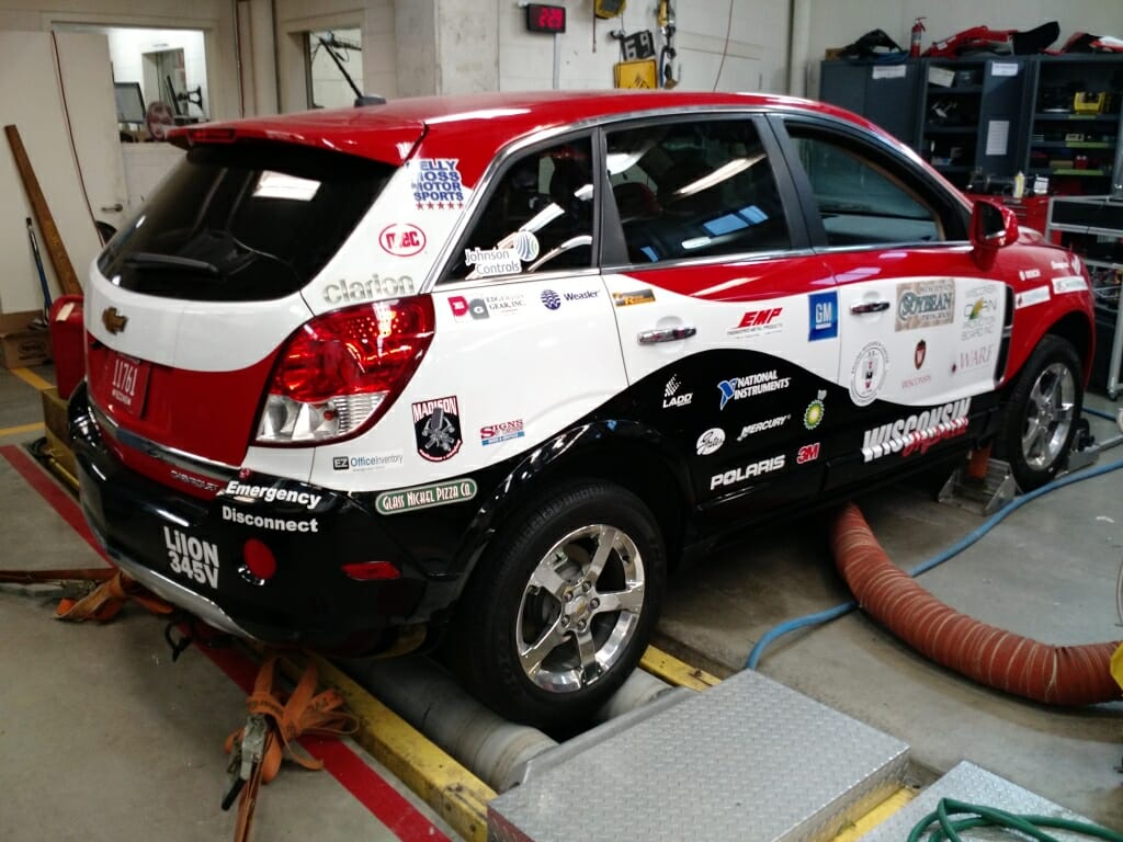 A hybrid-electric vehicle in a laboratory garage