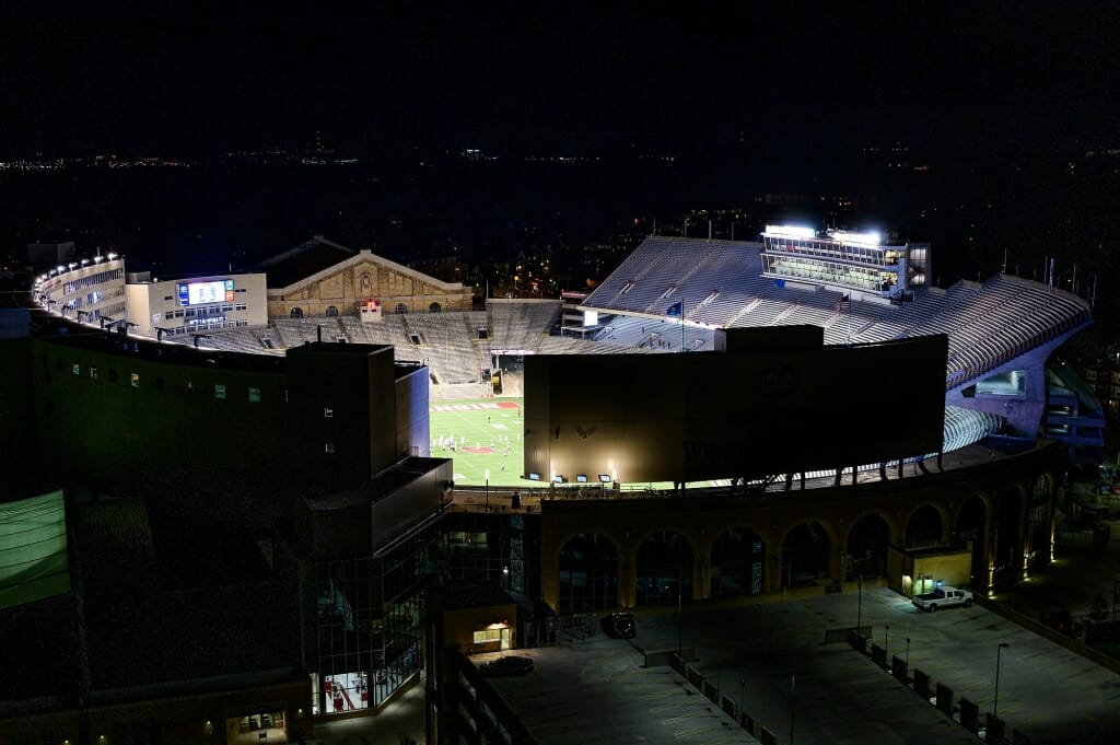 Seen from the top of a nearby building, the Badgers vs. Illinois football game with no crowd at Camp Randall Stadium presented an unusual game-day scene. The nearby streets were quiet as well, as gatherings were discouraged during the COVID-19 pandemic.