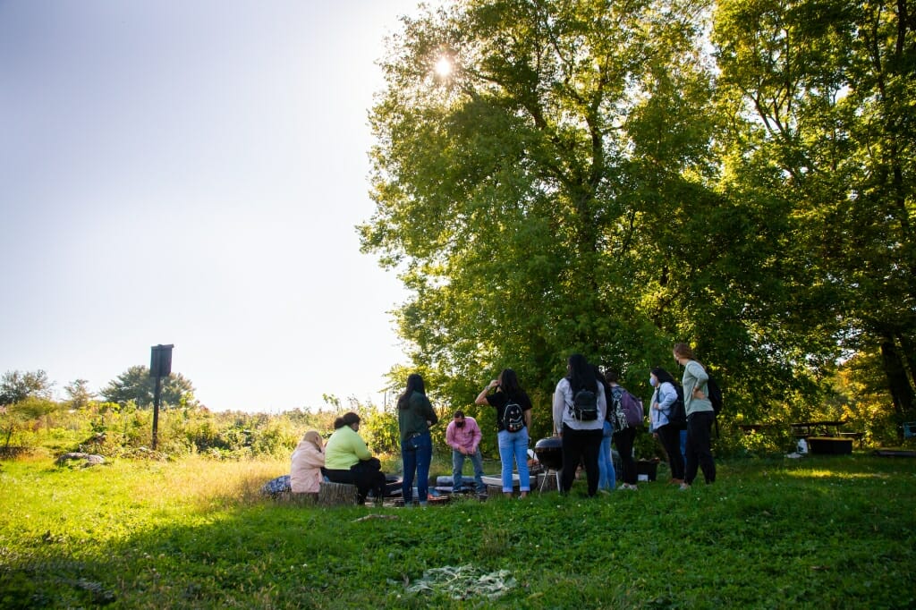 Students standing in a circle