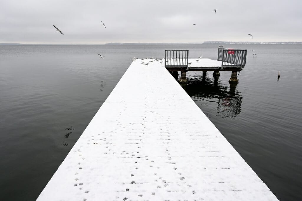 Snow-covered pier