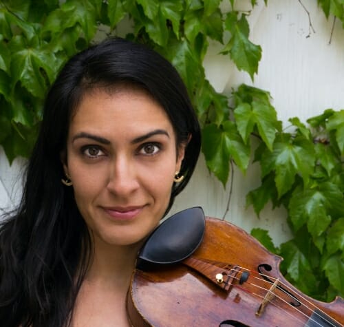 Paran Amirinazari holding a violin