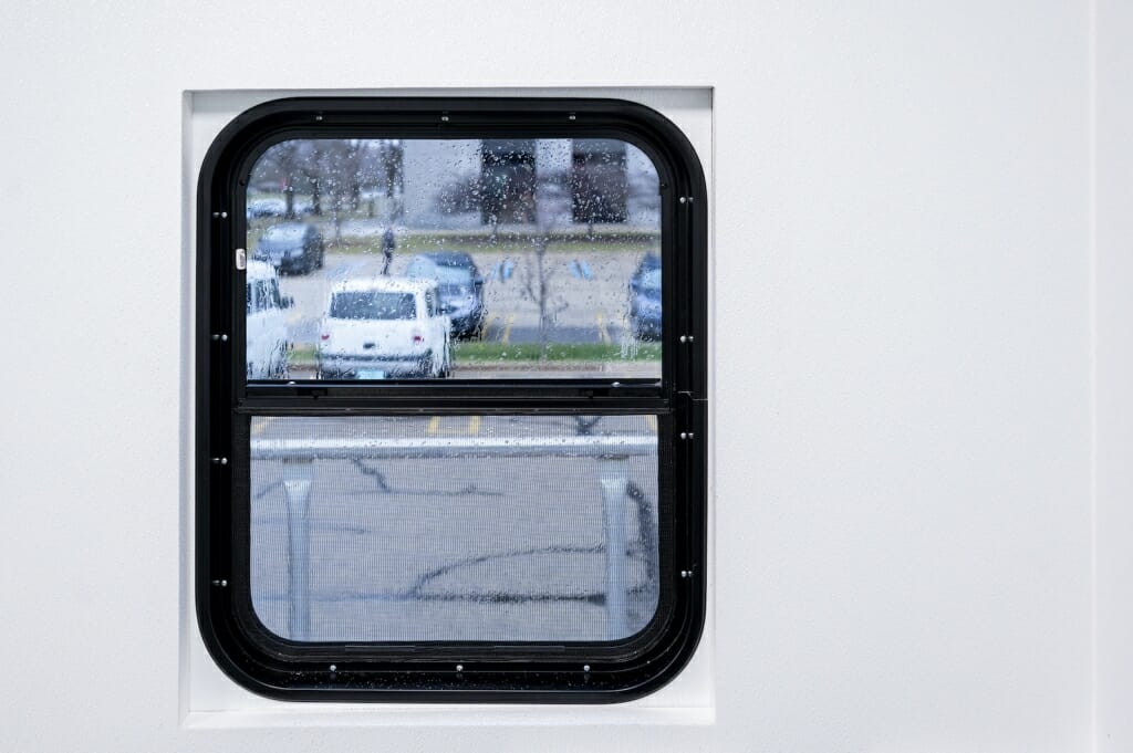 The intake window of a Shield T3 mobile COVID-19 testing lab at UW–Madison, which is located in parking lot 64 near the WARF Office Building. 