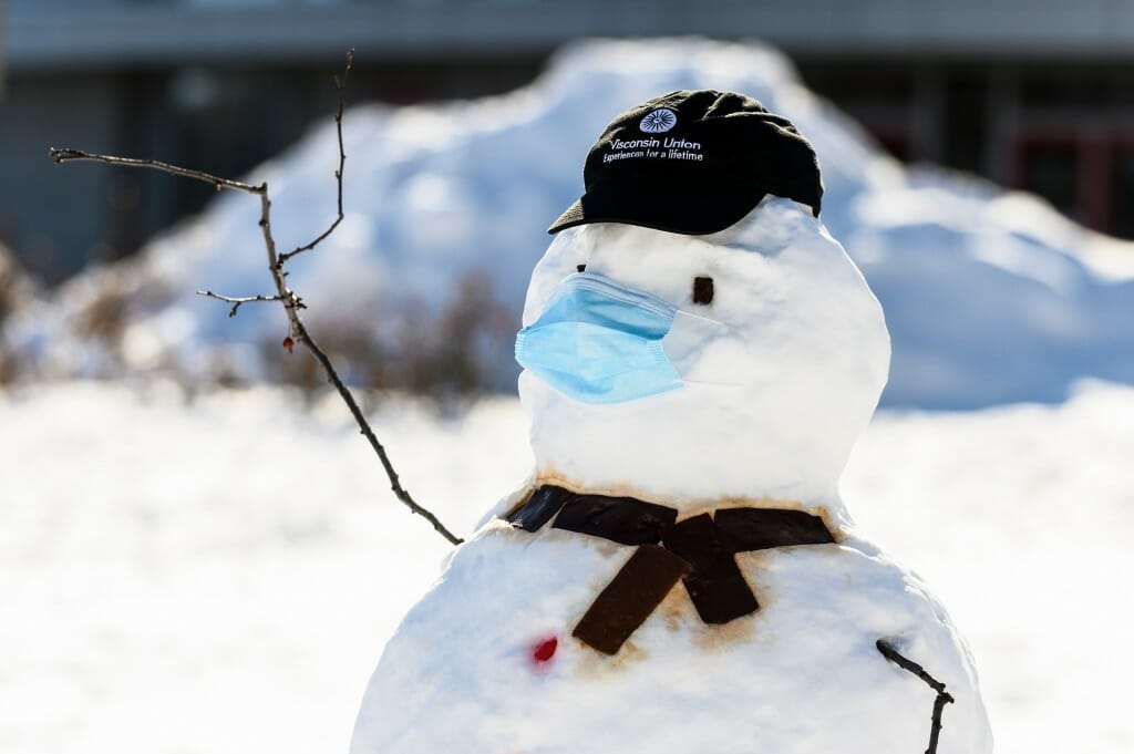 A mask to stay safe, and a scarf and hat for fashion.