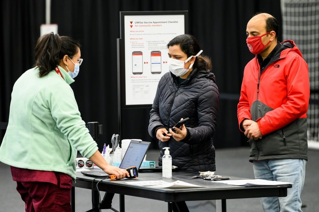 Photo of University Health Service medical assistant Sapana Shrestha checking in Garima Singh