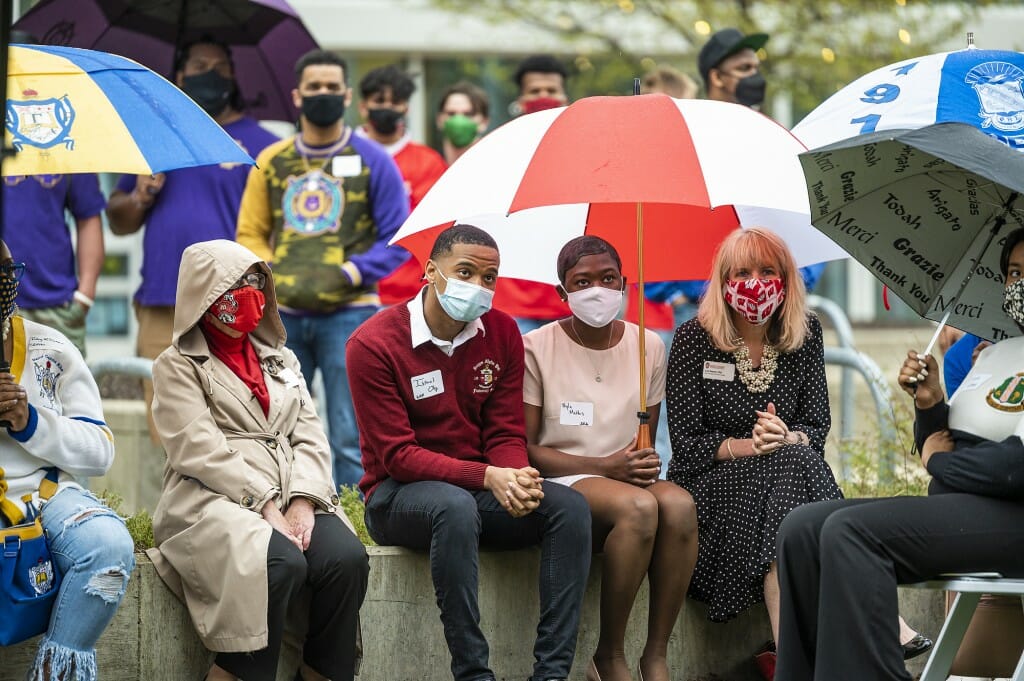 Chancellor Rebecca Blank, undergraduates Israel Oby and Nyla Mathis and Vice Chancellor for Student Affairs Lori Reesor (left to right), listen during the dedication ceremony.