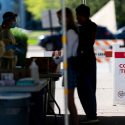 Students visit a COVID-19 testing site on Henry Mall on Sept. 2.  At the start of the fall semester, residence hall students were required to test once every two weeks, or more frequently if they experienced symptoms. During the outbreak, the university increased testing frequency.