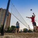 The setting sun provided a pretty backdrop to the volleyball action.