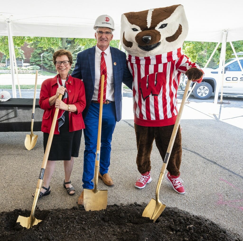 UW mascot Bucky Badger, Chancellor Rebecca Blank and School of Veterinary Medicine Dean Mark Markel take shovels in hand.