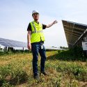 John Armstrong, a project manager with Madison Gas and Electric and 2012 alumnus of UW-Madison, leads a tour at O'Brien Solar Fields, which is the largest solar installation in Dane County. It's one of four projects MGE is working on under its Renewable Energy Rider.