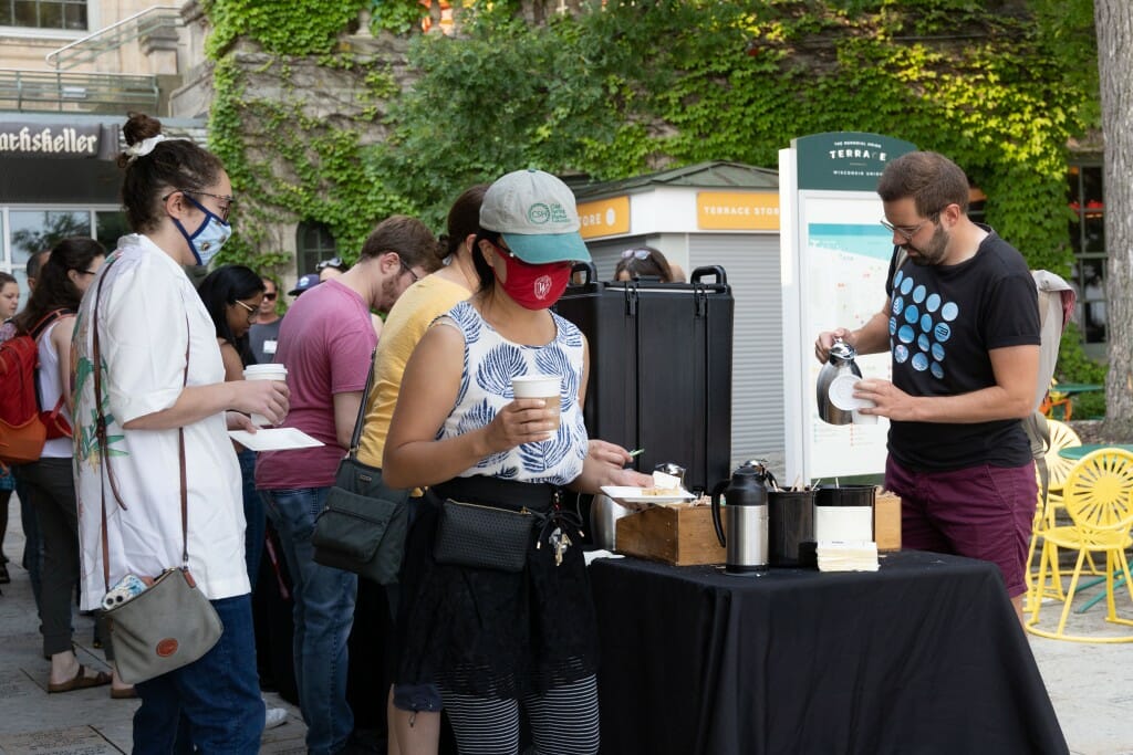 A person stands in line to get coffee