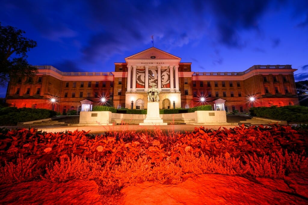 Hanging between the Bascom Hall’s building columns is a graphic banner of UW-Madison mascot Bucky Badger.