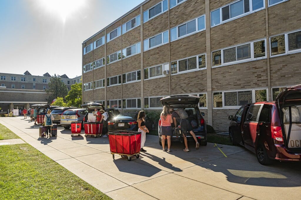 The sidewalks outside the residence halls filled with students, their families and their possessions going back and forth.