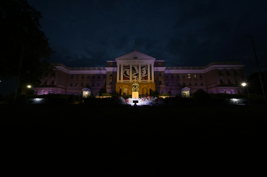 Bascom Hall is lit up in red, white and blue.