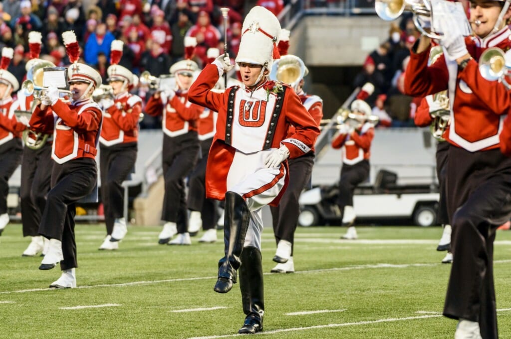 Zabat in uniform leading band on field