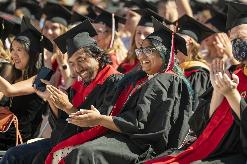 Graduates sitting in crowd