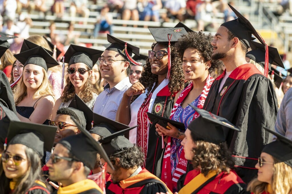 Graduates sitting in crowd