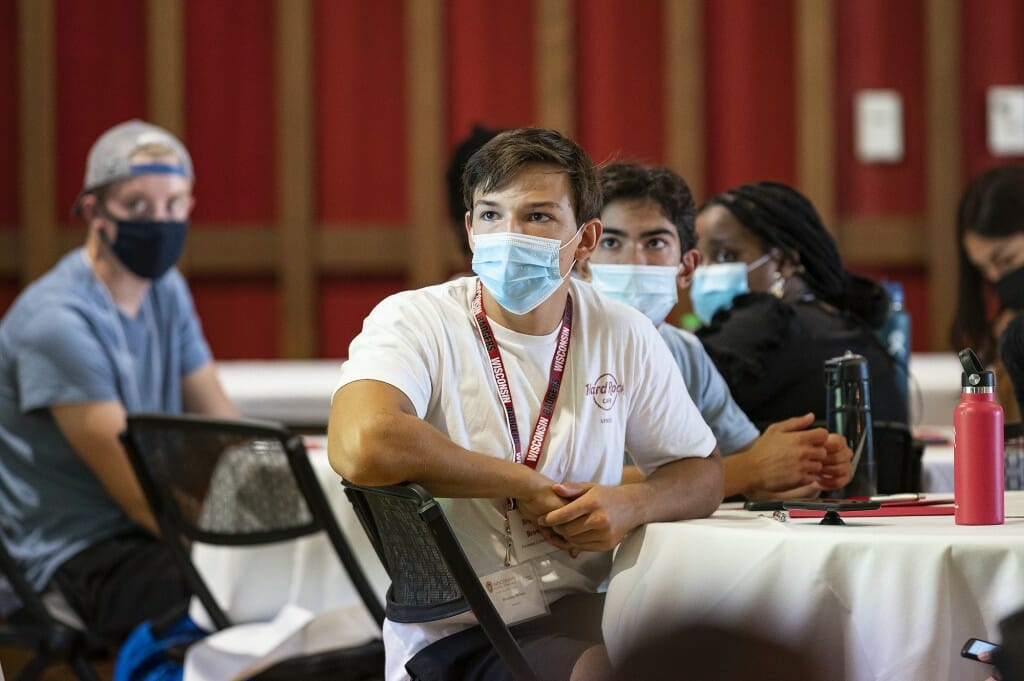 Students listen to the speaker.