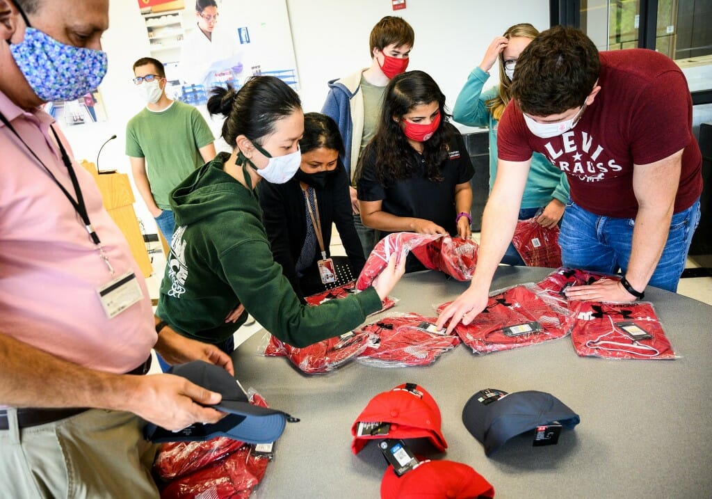 Wisconsin Veterinary Diagnostic Lab microbiologists and other frontline staff were given Wisconsin-branded merchandise by the Athletic Department.