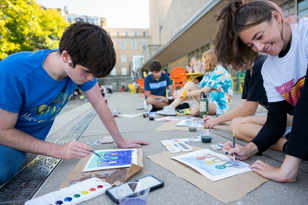 Students enjoy watercolor painting during The Terrace Paintacular, a part of the Labor Day Bash held at the Memorial Union.