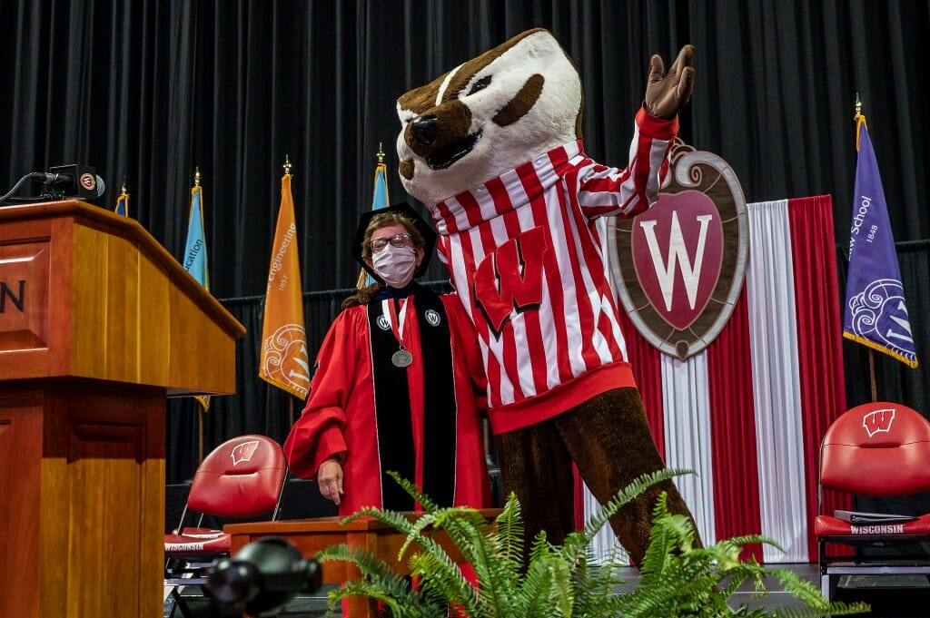 Bucky with his arm around Chancellor Blank's shoulder