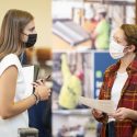 Student Camryn Ballweg (left) speaks with a recruiter from Duluth Trading Company.