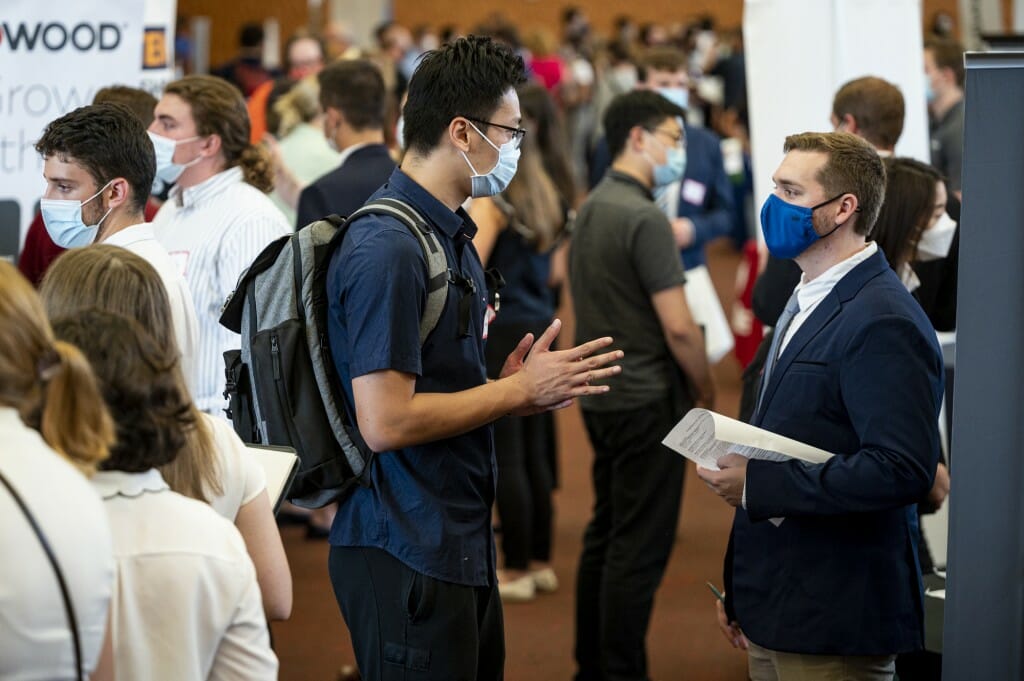 Student Ziyu Huang (left) was among the students exploring opportunities with the companies at the Career and Internship Fair.