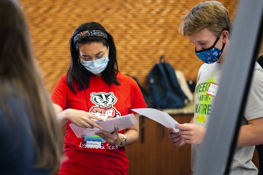 AiJing Wu, a junior majoring in Mathematics and Computer Science, talks to a recruiter.