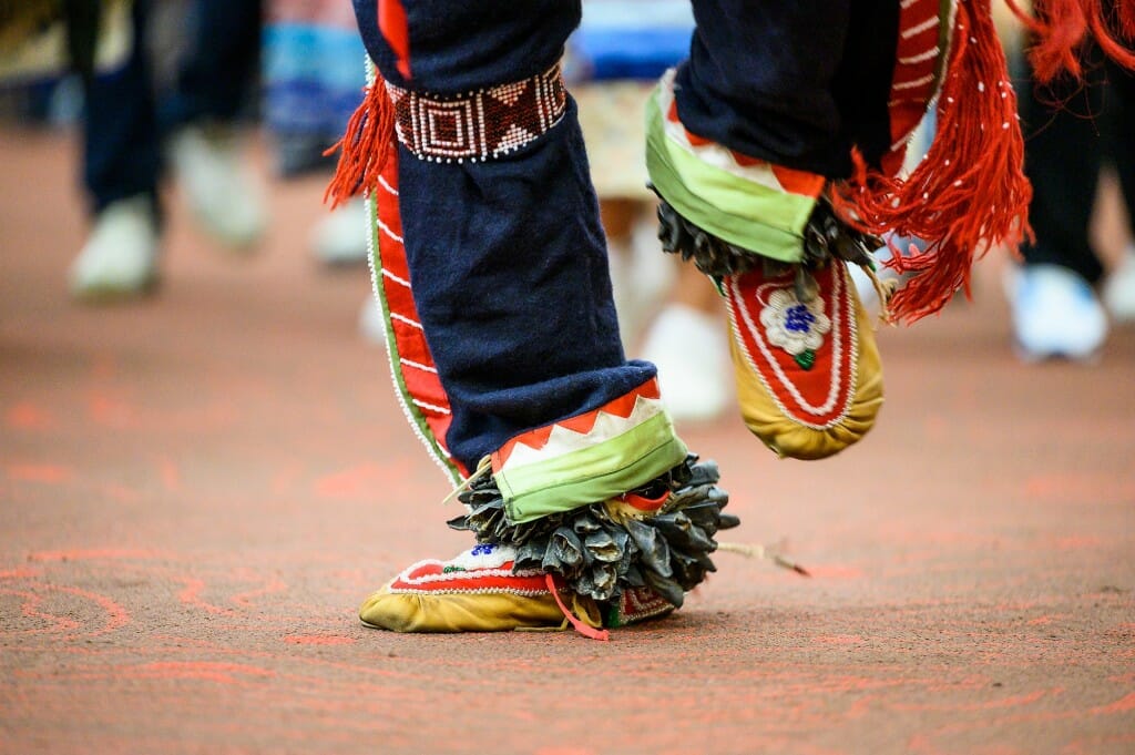 A dancer’s beaded clothing and footwear.