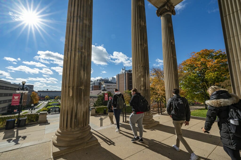 It's definitely jacket weather as students leave their midday classes at Agricultural Hall on a sunny but crisp early November afternoon. Before long, they'll be digging out their hats and gloves.