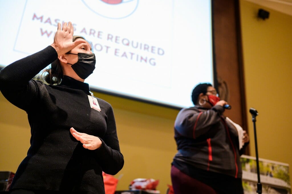 At left, Amy Free, a sign language interpreter with the McBurney Disability Resource Center, translates the spoken comments of Bretagne Ballard, associate director of student engagement and advocacy in University Housing.